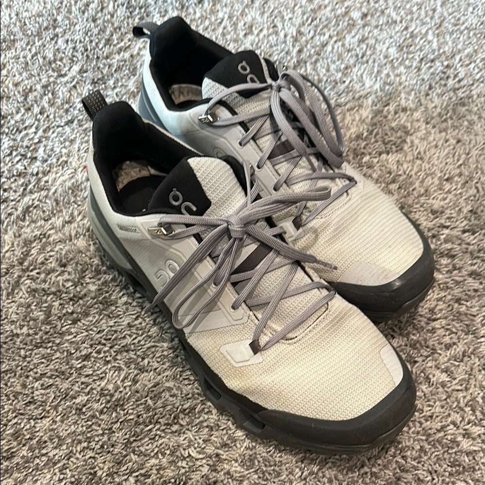 On Running Gray Athletic Shoes with Breathable Fabric and Unique Lacing System